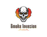 Scary skull with orange and yellow smoke coming out of mouth